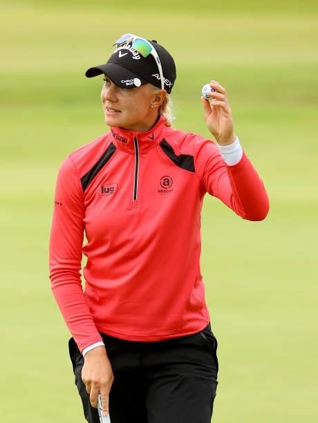Madelene Sagstrom of Sweden reacts after her putt on the 18th green during the first round of the AIG Women's Open at Carnoustie Golf Links on August...