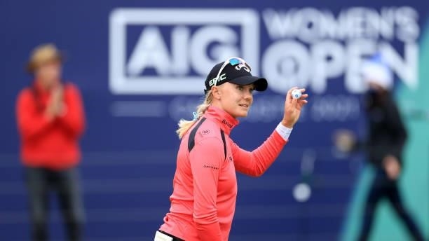 Madelene Sagstrom of Sweden acknowledges the crowd following a bogey on the eighteenth hole during Day One of the AIG Women's Open at Carnoustie Golf...
