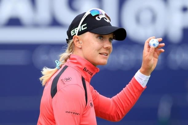 Madelene Sagstrom of Sweden acknowledges the crowd following a bogey on the eighteenth hole during Day One of the AIG Women's Open at Carnoustie Golf...