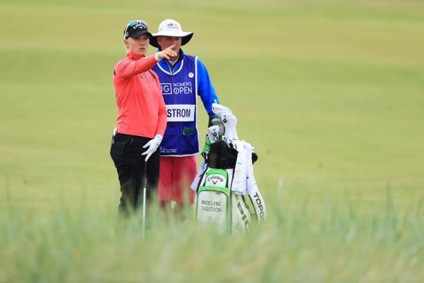 Madelene Sagstrom of Sweden points on the eighteenth hole during Day One of the AIG Women's Open at Carnoustie Golf Links on August 19, 2021 in...