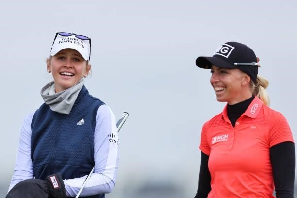 Jessica Korda of The United States and Sophia Popov of Germany laugh on the fourth hole during Day One of the AIG Women's Open at Carnoustie Golf...
