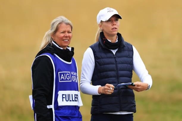 Annabell Fuller of England and her caddie look on from the first hole during Day One of the AIG Women's Open at Carnoustie Golf Links on August 19,...