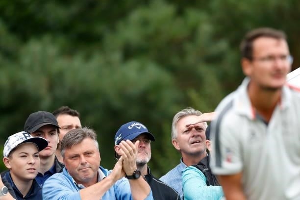 Fans applaud as Ondrej Lieser of Czech Republic prepares to play a tee shot on the seventh hole during Day One of The D+D Real Czech Masters at...