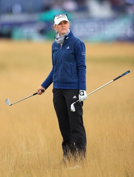 Jessica Korda of The United States choses a club for her second shot on the first hole during Day One of the AIG Women's Open at Carnoustie Golf...