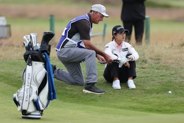 Sei Young Kim of South Korea and her caddie look on during Day One of the AIG Women's Open at Carnoustie Golf Links on August 19, 2021 in Carnoustie,...