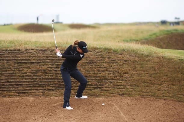 Jenny Shin of The United States plays a bunker shot for her second shot on the fourteenth hole during Day One of the AIG Women's Open at Carnoustie...