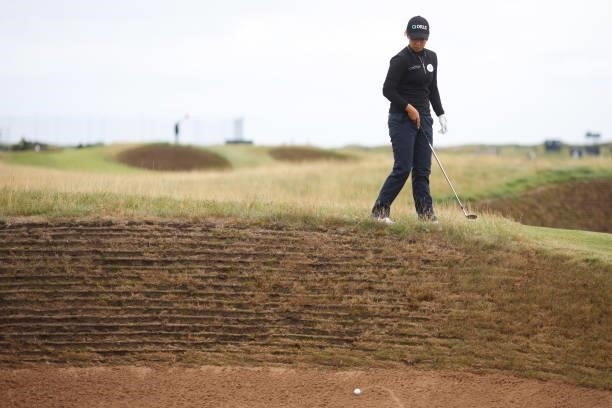 Jenny Shin of The United States prepares to play a bunker shot on the fourteenth hole during Day One of the AIG Women's Open at Carnoustie Golf Links...