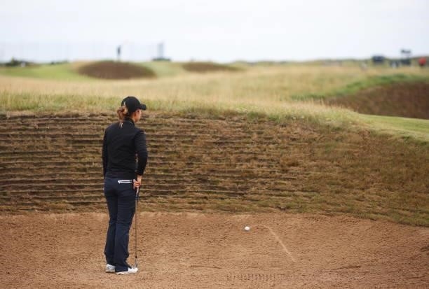 Jenny Shin of The United States prepares to play a bunker shot on the fourteenth hole during Day One of the AIG Women's Open at Carnoustie Golf Links...