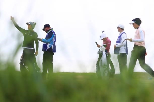 Pernilla Lindberg of Sweden, Karolin Lampert of Germany and Albane Valenzuela of Switzerland prepare to tee off on the eighteenth hole during Day One...