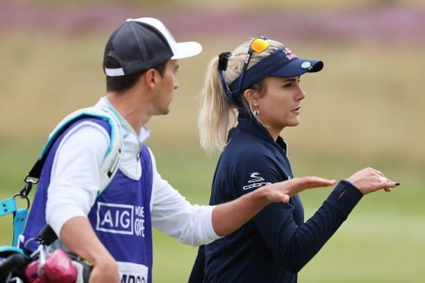 Lexi Thompson of The United States talks with her caddie on the sixth hole during Day One of the AIG Women's Open at Carnoustie Golf Links on August...
