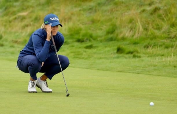 Sanna Nuutinen of Finland lines up her putt on the first green during the first round of the AIG Women's Open at Carnoustie Golf Links on August 19,...