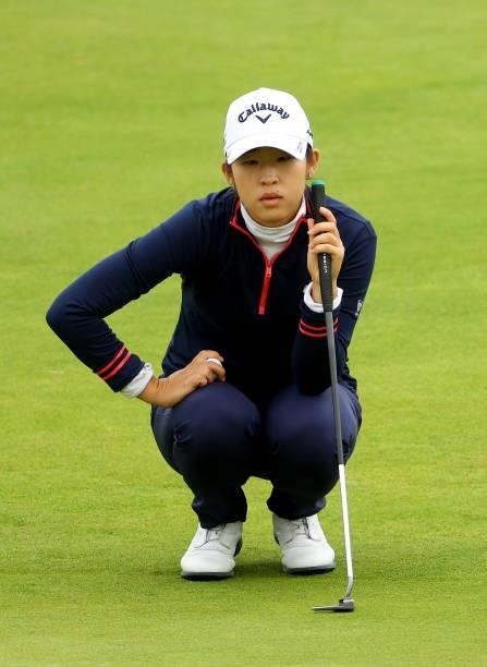 Andrea Lee of The United States lines up her putt on the 15th green during the first round of the AIG Women's Open at Carnoustie Golf Links on August...