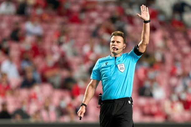 Referee Felix Brych reacts during the UEFA Champions League Play-Offs Leg One match between SL Benfica and PSV Eindhoven at Estadio da Luz on August...