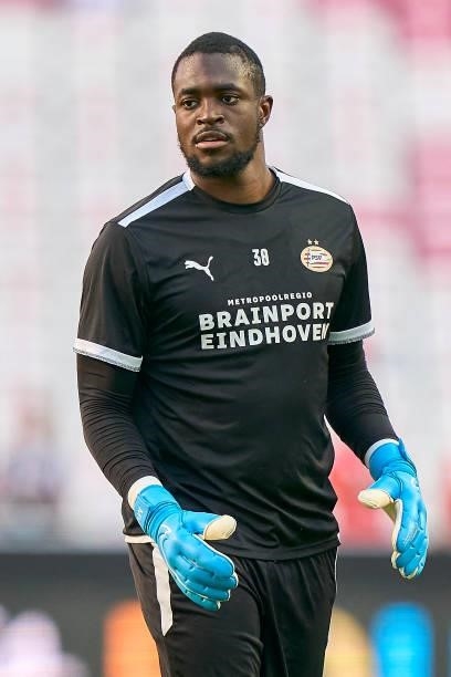Yvon Mvogo of PSV Eindhoven looks on during the warm up prior to the UEFA Champions League Play-Offs Leg One match between SL Benfica and PSV...