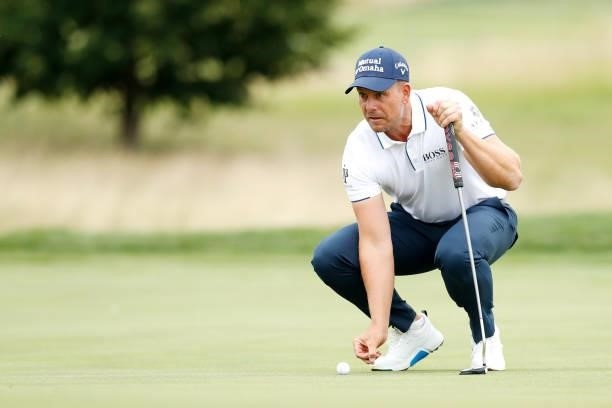 Henrik Stenson of Sweden lines up a putt shot on the 13th hole during Day One of The D+D Real Czech Masters at Albatross Golf Resort on August 19,...