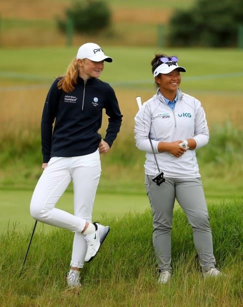 Louise Duncan of Scotland and Megan Khang of The United States on the 14th hole during the first round of the AIG Women's Open at Carnoustie Golf...