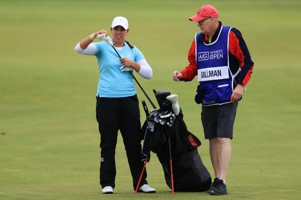 Kristen Gillman of the United States picks a club on the eighteenth hole during Day One of the AIG Women's Open at Carnoustie Golf Links on August...