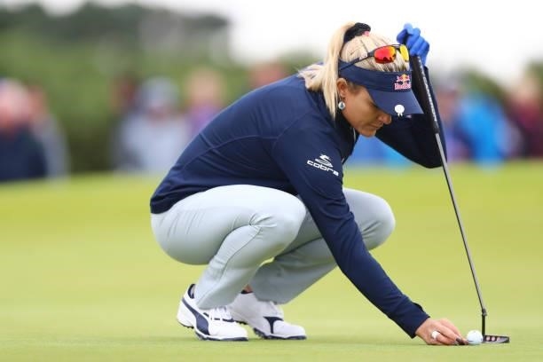 Lexi Thompson of The United States lines up a putt on the thirteenth green during Day One of the AIG Women's Open at Carnoustie Golf Links on August...