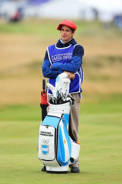 The caddie of Magdalena Simmermacher of Argentina stands with the club bag during Day One of the AIG Women's Open at Carnoustie Golf Links on August...