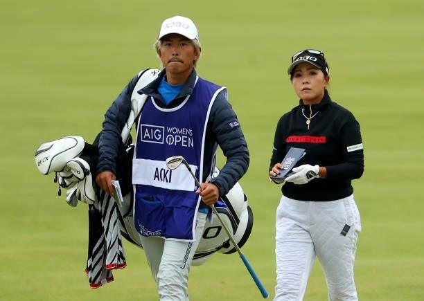 Serena Aoki of Japan and her caddie on the 18th hole during the first round of the AIG Women's Open at Carnoustie Golf Links on August 19, 2021 in...