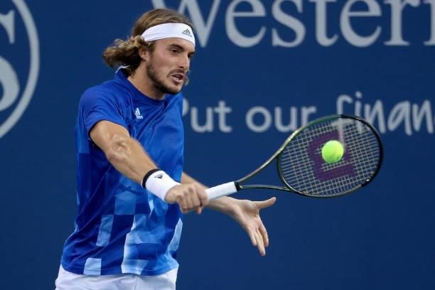 Stefanos Tsitsipas of Greece plays a backhand during his match against Lorenzo Sonego of Italy during Western & Southern Open - Day 5 at the Lindner...