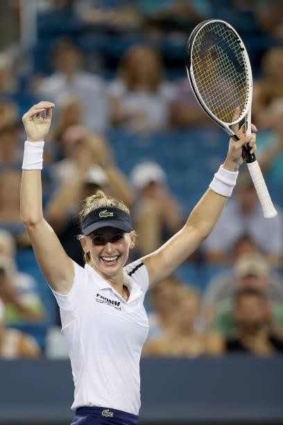 Jill Teichmann of Switzerland celebrates her win against Naomi Osaka of Japan during the Western & Southern Open at Lindner Family Tennis Center on...