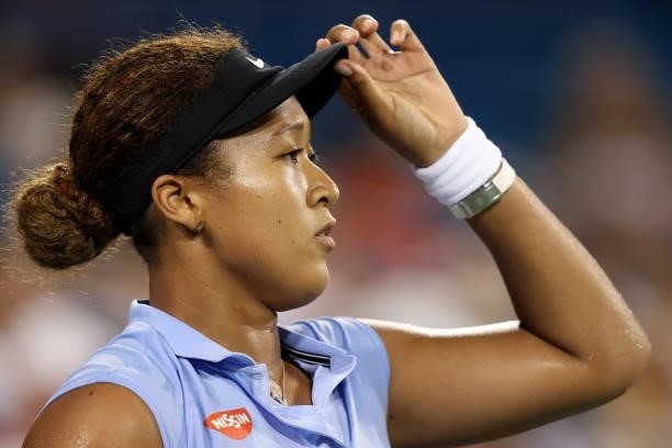 Naomi Osaka of Japan plays Jill Teichmann of Switzerland during the Western & Southern Open at Lindner Family Tennis Center on August 19, 2021 in...