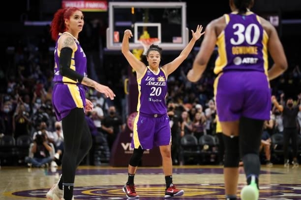 Amanda Zahui B and Kristi Toliver, of the Los Angeles Sparks react to a game-winning shot by Nneka Ogwumike in the second half against the Atlanta...
