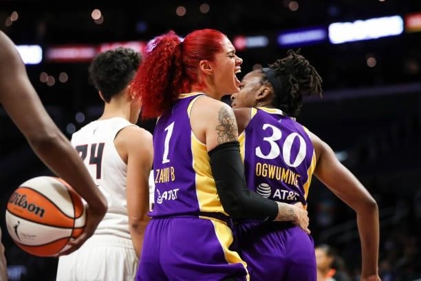 Amanda Zahui B of the Los Angeles Sparks reacts to a foul called against the Atlanta Dream in the second half with Nneka Ogwumike at Staples Center...