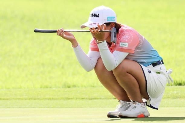 Kana Nagai of Japan lines up her putt on the 1st hole during the first round of the CAT Ladies at Daihakone Country Club on August 20, 2021 in...