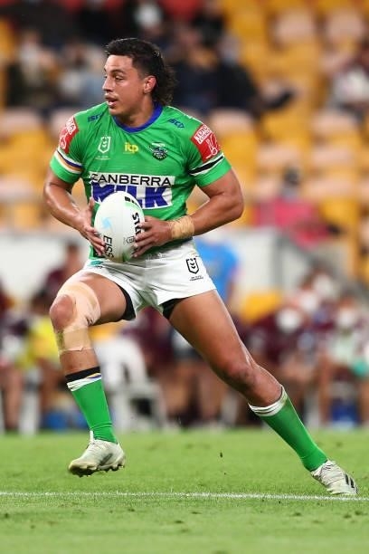 Joseph Tapine of the Raiders is tackled during the round 23 NRL match between the Canberra Raiders and the Manly Sea Eagles at Suncorp Stadium, on...