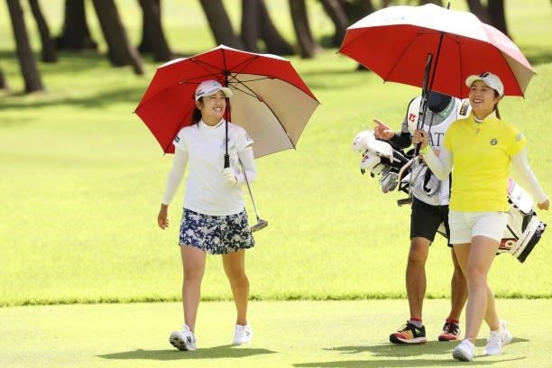 Mone Inami of Japan and Momoko Osato of Japan smile during the first round of the CAT Ladies at Daihakone Country Club on August 20, 2021 in Hakone,...