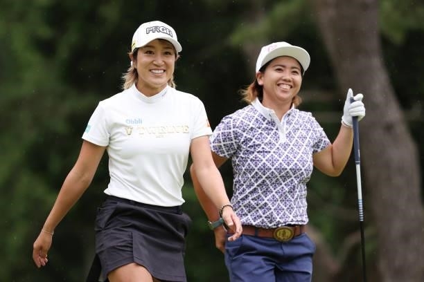Asako Fujimoto of Japan and Nana Yamashiro of Japan smile during the first round of the CAT Ladies at Daihakone Country Club on August 20, 2021 in...