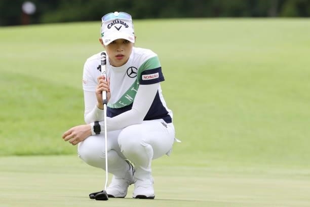 Asuka Kashiwabara of Japan lines up her putt on the 18th hole during the first round of the CAT Ladies at Daihakone Country Club on August 20, 2021...