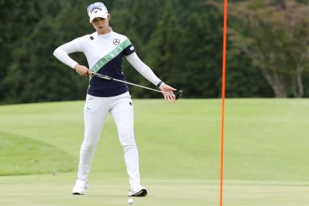 Asuka Kashiwabara of Japan putts on the 18th hole during the first round of the CAT Ladies at Daihakone Country Club on August 20, 2021 in Hakone,...
