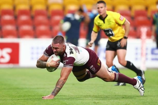Curtis Sironen of the Sea Eagles scores a try during the round 23 NRL match between the Canberra Raiders and the Manly Sea Eagles at Suncorp Stadium,...