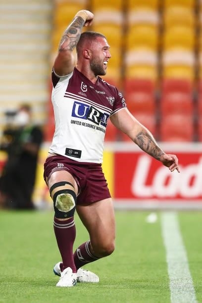 Curtis Sironen of the Sea Eagles celebrates scoring a try during the round 23 NRL match between the Canberra Raiders and the Manly Sea Eagles at...
