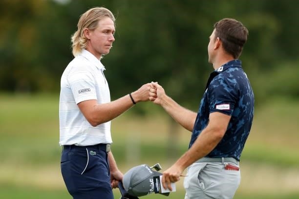 Maverick Antcliff of Australia fist bumps Louis de Jager of South Africa after their round during Day Two of The D+D Real Czech Masters at Albatross...