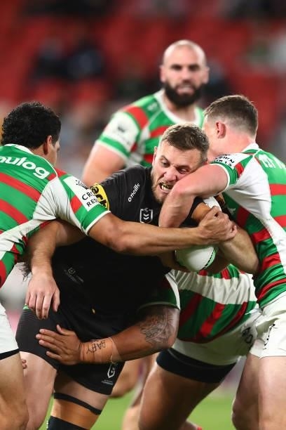 Kurt Capewell of the Panthers is tackled during the round 23 NRL match between the Penrith Panthers and the South Sydney Rabbitohs at Suncorp...