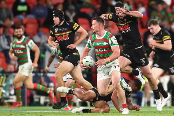 Damien Cook of the Rabbitohs makes a break during the round 23 NRL match between the Penrith Panthers and the South Sydney Rabbitohs at Suncorp...