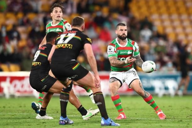 Adam Reynolds of the Rabbitohs passes during the round 23 NRL match between the Penrith Panthers and the South Sydney Rabbitohs at Suncorp Stadium,...