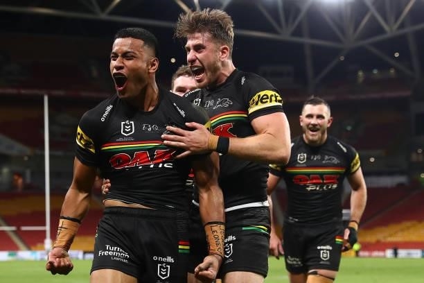 Stephen Crichton of the Panthers celebrates scoring a try with team mates during the round 23 NRL match between the Penrith Panthers and the South...