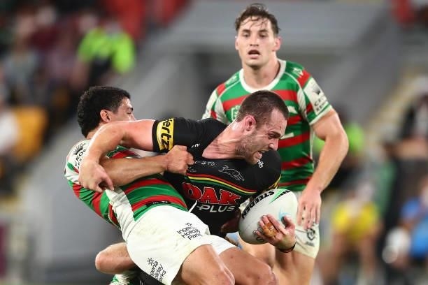 Isaah Yeo of the Panthers is tackled during the round 23 NRL match between the Penrith Panthers and the South Sydney Rabbitohs at Suncorp Stadium, on...