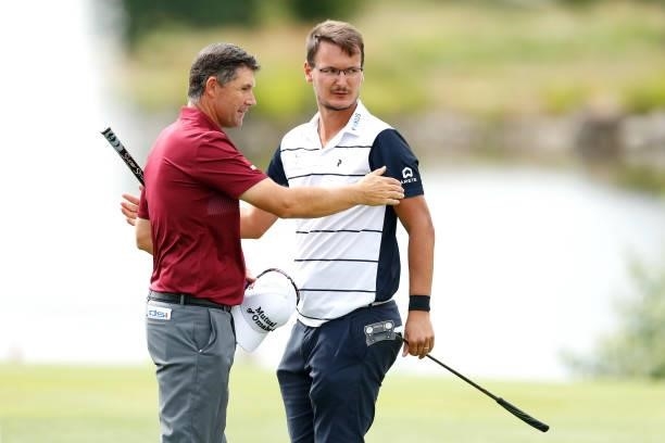 Padraig Harrington of Ireland and Ondrej Lieser of Czech Republic shake hands after their round during Day Two of The D+D Real Czech Masters at...