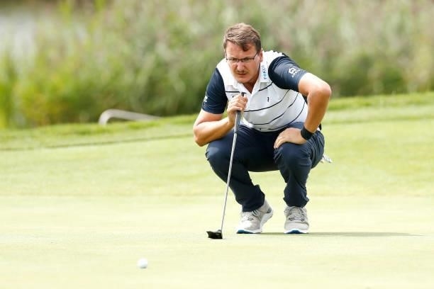 Ondrej Lieser of Czech Republic lines up a putt on the ninth hole during Day Two of The D+D Real Czech Masters at Albatross Golf Resort on August 20,...