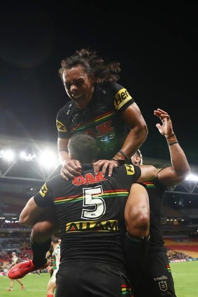 Brent Naden of the Panthers celebrates scoring a try with team mate Jerome Luai of the Panthers during the round 23 NRL match between the Penrith...