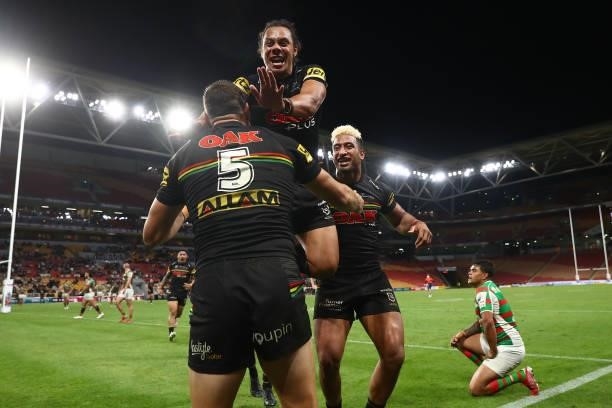 Brent Naden of the Panthers celebrates scoring a try with team mate Jerome Luai of the Panthers during the round 23 NRL match between the Penrith...