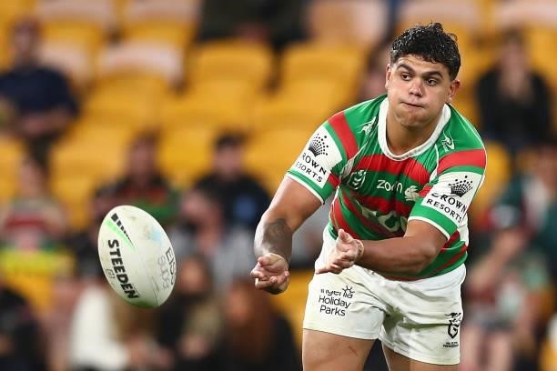 Latrell Mitchell of the Rabbitohs passes during the round 23 NRL match between the Penrith Panthers and the South Sydney Rabbitohs at Suncorp...