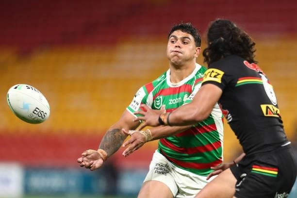 Latrell Mitchell of the Rabbitohs passes during the round 23 NRL match between the Penrith Panthers and the South Sydney Rabbitohs at Suncorp...