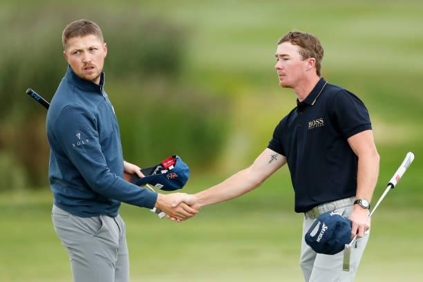 Richard Mansell of England and Sean Crocker of United States shake hands after their round during Day Two of The D+D Real Czech Masters at Albatross...